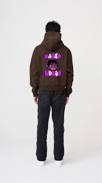 the back of a man wearing a purple hoodie